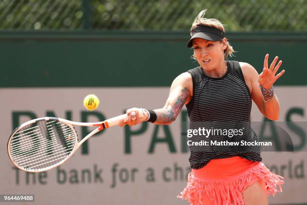 Bethanie Mattek-Sands of The United plays a forehand during her ladies singles second round match against Andrea Perkovic of Germany during day five...