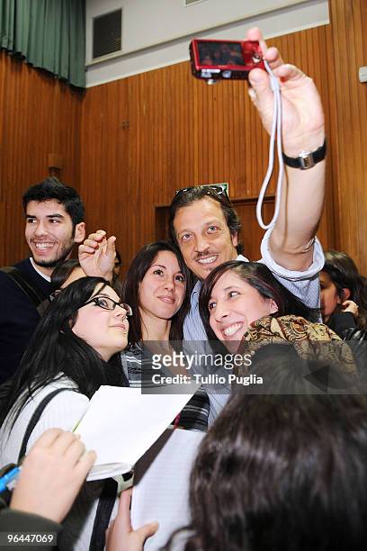 Italian director Gabriele Muccino poses with students of Palermo University during presentation of his latest movie 'Baciami Ancora' on February 5,...