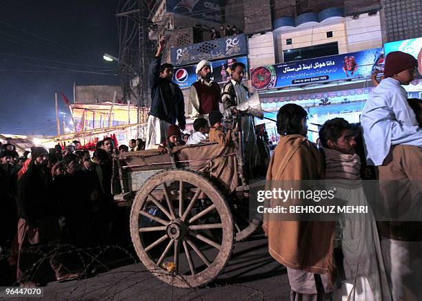 Pakistani Muslims flock to the streets near the Data Darbar, which holds the Saint Syed Ali bin Osman Al-Hajvery shrine and is popularly known as...