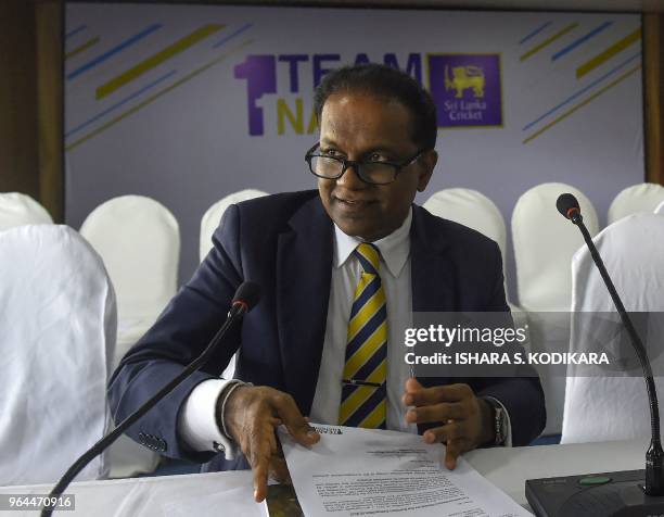 Sri Lanka cricket president Thilanga Sumathipala looks on after a press conference in Colombo on May 31, 2018. - Sri Lanka's cricket chief on May 31...