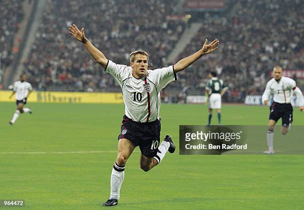 Michael Owen of England celebrates scoring a goal during the FIFA 2002 World Cup Qualifier against Germany played at the Olympic Stadium in Munich,...