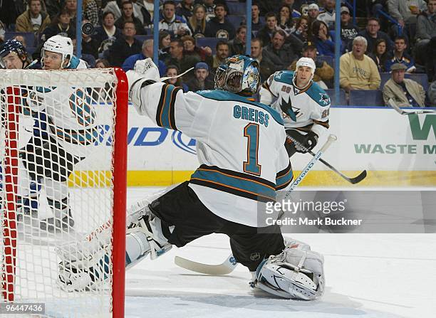 Thomas Greiss of the San Jose Sharks redirects the puck in the game against the St. Louis Blues on February 4, 2010 at Scottrade Center in St. Louis,...