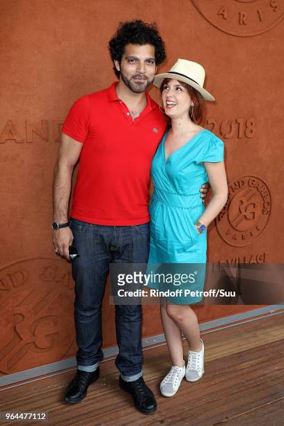 Actress Justine Le Pottier and actor Vincent Heneine attend the 2018 French Open - Day Five at Roland Garros on May 31, 2018 in Paris, France.