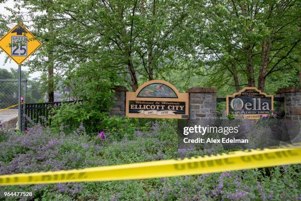 Police tape blocks off the entrance to Ellicott City as Main Street remains closed under police guard following devastating flooding on May 31, 2018...