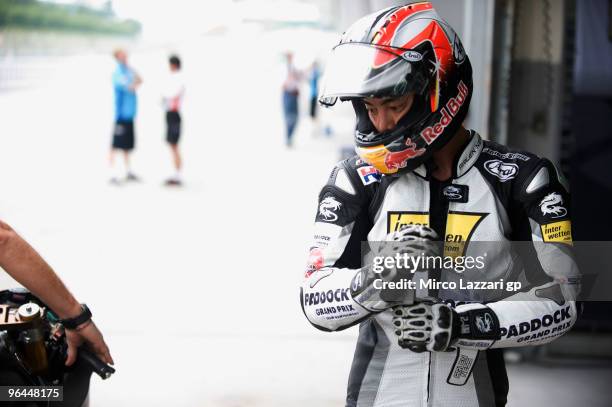 Hiroshi Aoyama of Japan and Interwetten MotoGP Team looks on in box during the final day of the MotoGP test at Sepang International Circuit, near...