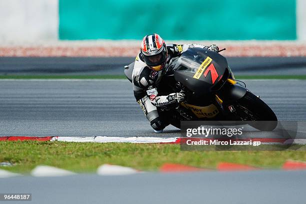 Hiroshi Aoyama of Japan and Interwetten MotoGP Team rounds the bend during the final day of the MotoGP test at Sepang International Circuit, near...