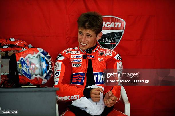 Casey Stoner of Australia and Ducati Marlboro Team looks on in box during the final day of the MotoGP test at Sepang International Circuit, near...