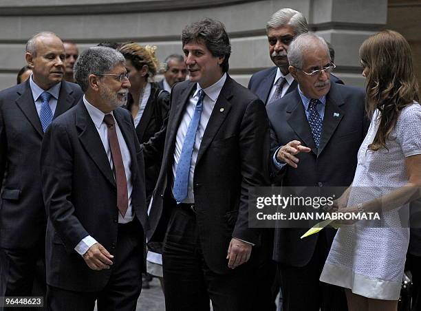 Brazil's Economy Minister Guido Mantega, Brazil's Foreign Minister Celso Amorim, Argentina's Economy Minister Amado Boudou, Brazil's Industry...