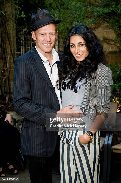 Paul Simonon and Serena Rees attend the Sacha Newley 'Blessed Curse' exhibition private view at The Arts Club on July 2, 2008 in London, England.