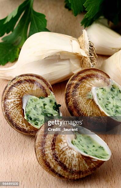 traditonal french snails - flat leaf parsley stock pictures, royalty-free photos & images