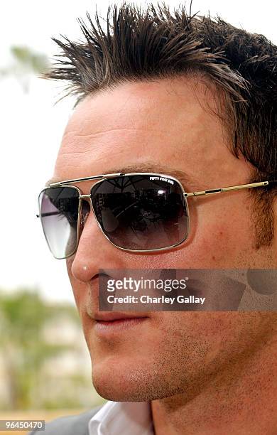 Actor Owain Yeoman in 55 DSL Chakra sunglasses poses at the Solstice Sunglass Boutique and Safilo USA during the HBO Luxury Lounge in honor of the...