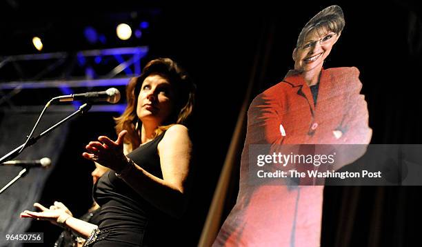 Sarah Palen life-size cutout sits on stage during Ray Stevens and band part of the show... Hundreds of attendees at the three day National Tea Party...