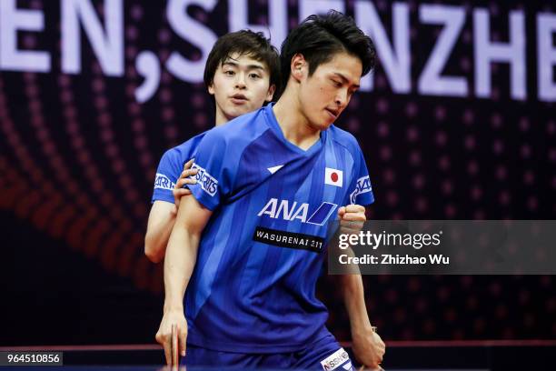 Morizono Masataka and Oshima Yuya of Japan in action at the men's doubles match compete with Pistej Lubomir of Slovenska and Pitchford Liam of...