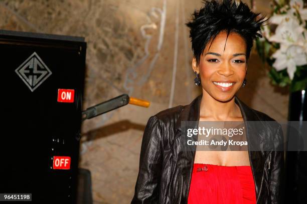Michelle Williams lights the Empire State Building red for Go Red for Women on February 5, 2010 in New York City.