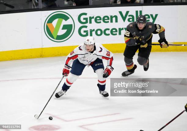 Washington Capitals left wing Andre Burakovsky looks to pass the puck during the second period of Game Two of the Stanley Cup Final between the...