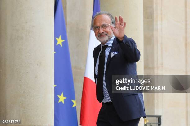 French right-wing Les Republicains party members of parliament Olivier Dassault poses as he arrives at the Elysee Palace in Paris on May 31 before...