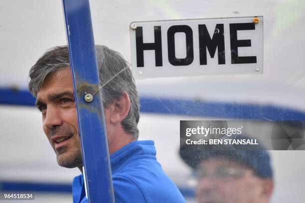 Abkhazia head coach Beslan Ajinjal looks on during the Confederation of Independent Football Association 's 2018 World Football Cup match between...