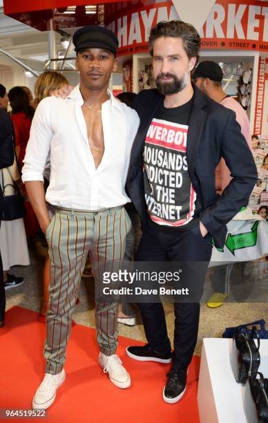 Eric Underwood and Jack Guinness attend Hello Magazine's 30th anniversary party at Dover Street Market on May 9, 2018 in London, England.