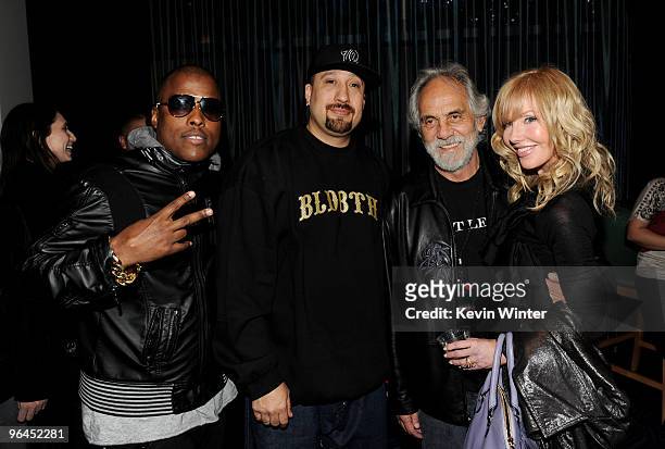 Rapper Won G, rapper B-Real, comedian Tommy Chong and his wife Shelby pose backstage at Help Haiti with George Lopez & Friends at L.A. Live's Nokia...