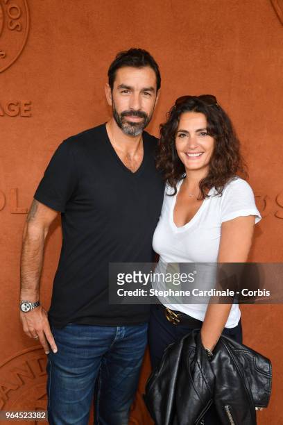 Football player Robert Pires and his wife Jessica attend the 2018 French Open - Day Five at Roland Garros on May 31, 2018 in Paris, France.