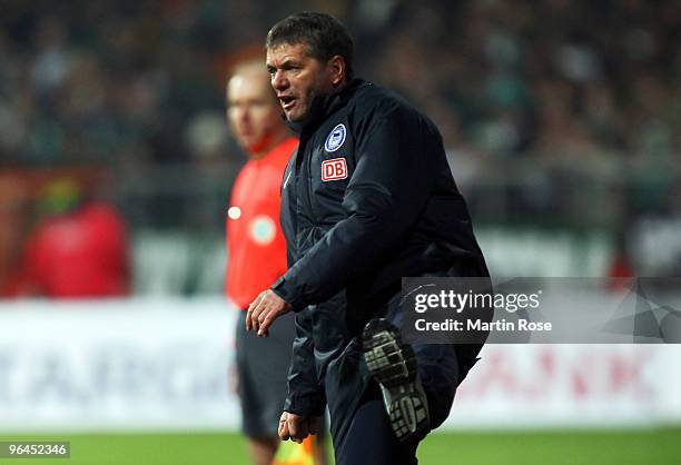 Friedhelm Funkel, head coach of Berlin reacts during the Bundesliga match between Werder Bremen and Hertha BSC Berlin at the Weser stadium on...