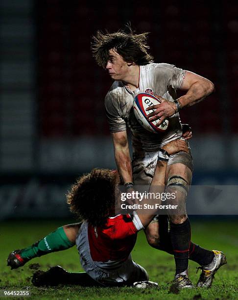 England number 8 Alex Gray breaks the tackle of Wales player Toby Faletau during the International match between England U20 and Wales U20...