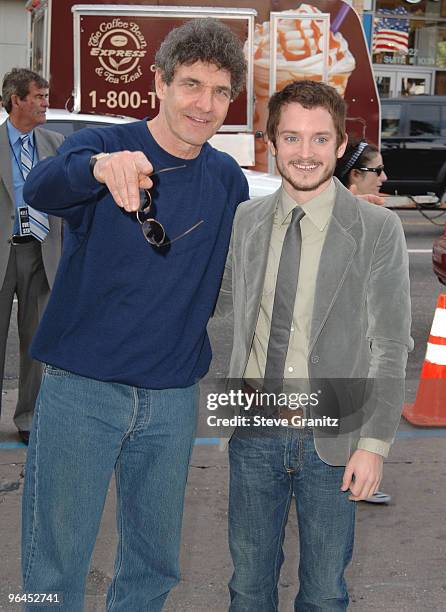 Warner Bros. Entertainment President & COO Alan Horn and Elijah Wood