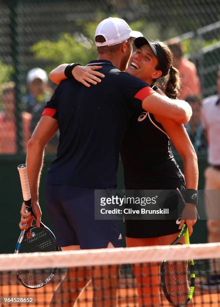 Johanna Konta of Great Britain and partner Dominic Inglot of Great Britain celebrate during their mixed doubles first round match against Fiona Ferro...