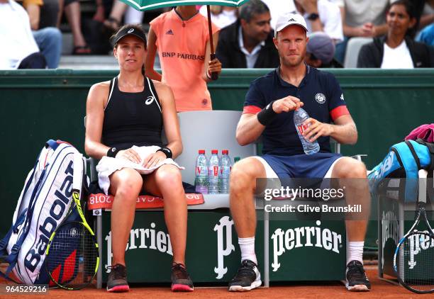 Johanna Konta of Great Britain and partner Dominic Inglot of Great Britain in action during their mixed doubles first round match against Fiona Ferro...