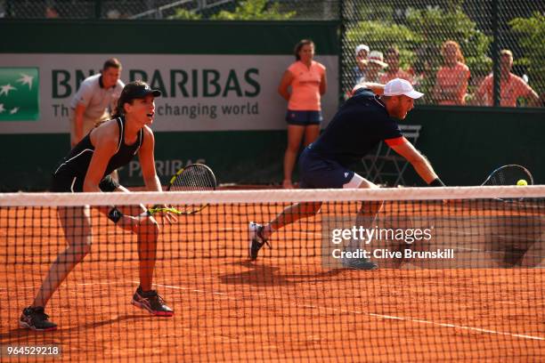 Johanna Konta of Great Britain and partner Dominic Inglot of Great Britain in action during their mixed doubles first round match against Fiona Ferro...