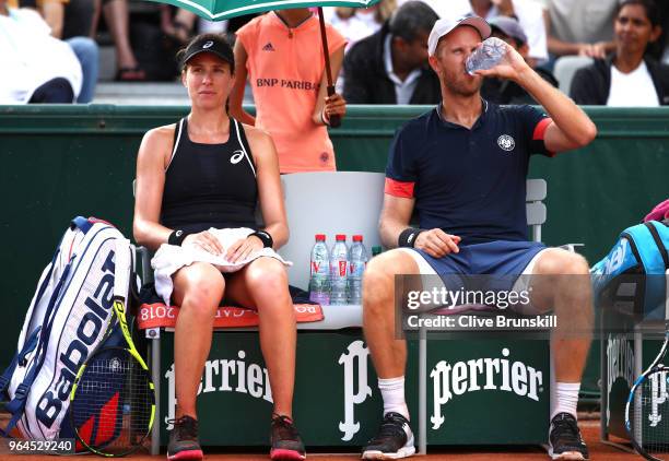 Johanna Konta of Great Britain and partner Dominic Inglot of Great Britain in action during their mixed doubles first round match against Fiona Ferro...