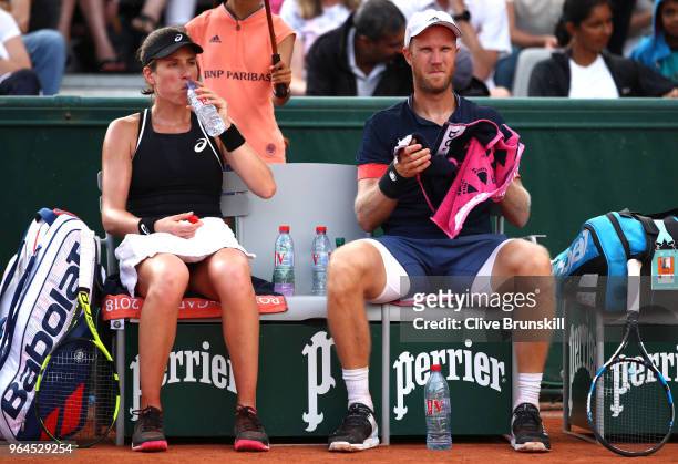 Johanna Konta of Great Britain and partner Dominic Inglot of Great Britain in action during their mixed doubles first round match against Fiona Ferro...