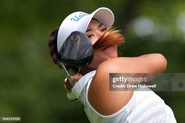 Patty Tavatanakit of Thailand plays a tee shot on the 14th hole during the first round of the 2018 U.S. Women's Open at Shoal Creek on May 31, 2018...