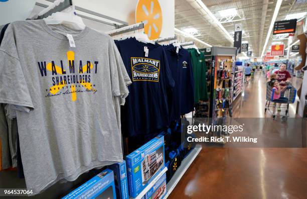 Shirts promoting the Walmart shareholders week are for sale at a Walmart Supercenter during the annual shareholders meeting event on May 31, 2018 in...