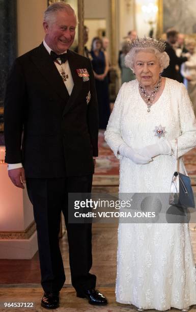 Britain's Prince Charles, Prince of Wales , Britain's Queen Elizabeth II, Commonwealth Secretary-General Patricia Scotland and Britain's Prime...