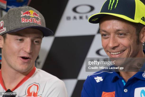 Jack Miller of Australia and Pramac Racing speaks with Valentino Rossi of Italy and Movistar Yamaha MotoGP during the press conference pre-event...