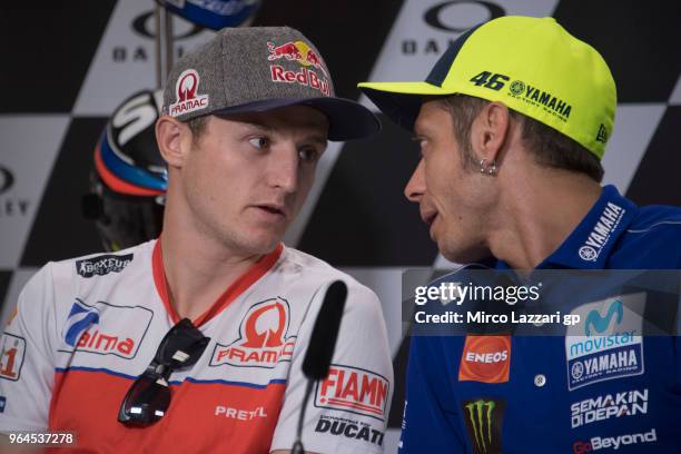 Jack Miller of Australia and Pramac Racing speaks with Valentino Rossi of Italy and Movistar Yamaha MotoGP during the press conference pre-event...