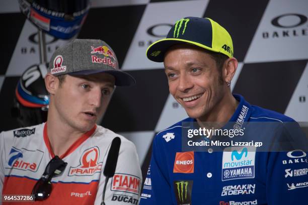 Jack Miller of Australia and Pramac Racing speaks with Valentino Rossi of Italy and Movistar Yamaha MotoGP during the press conference pre-event...