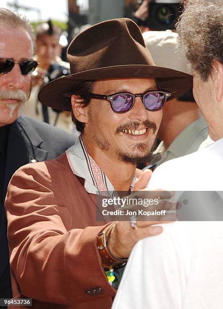 Johnny Depp and Warner Bros.' Alan Horn