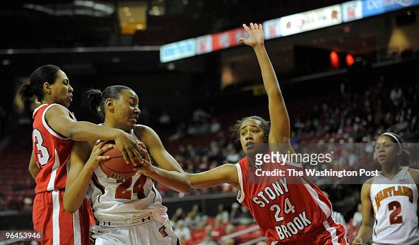 College Park, United States Maryland's Diandra Tchatchouang, a freshman forward, gets pressure early in the game from Stony Brook's Crystal Rushin,...