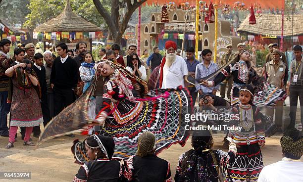 Rajasthani dancers perform at the Surajkund Crafts Mela in Faridabad on February 1, 2010.