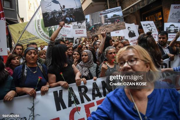 People demonstrate on May 31, 2018 in Istanbul, to mark the fifth anniversary of the start of the Gezi Park protests. - The Gezi Park protests which...