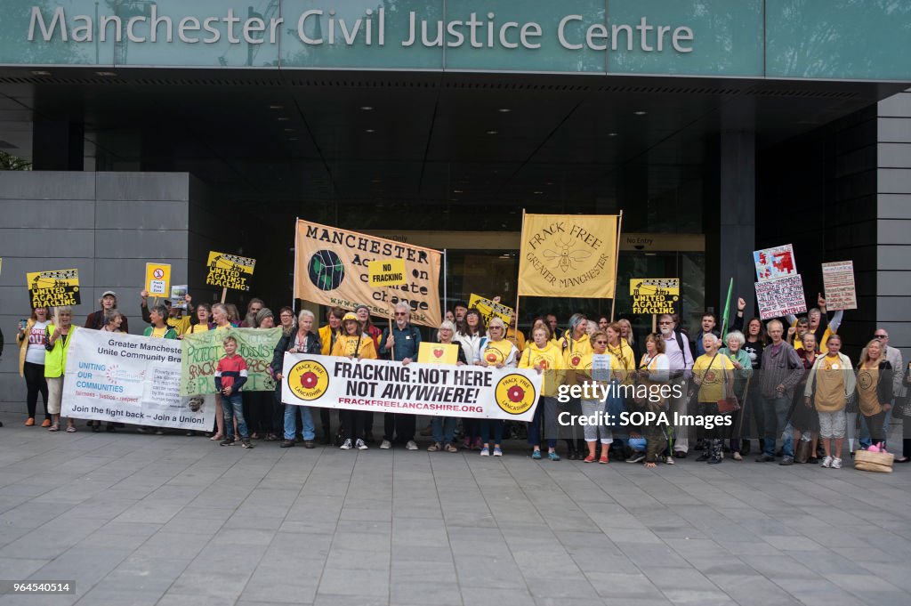 Protesters seen holding banners and placards during the...