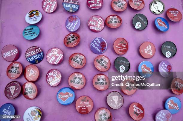 Badges on sale as the abortion rights campaign group ROSA, Reproductive Rights Against Oppression, Sexism and Austerity hold a rally at Guildhall...