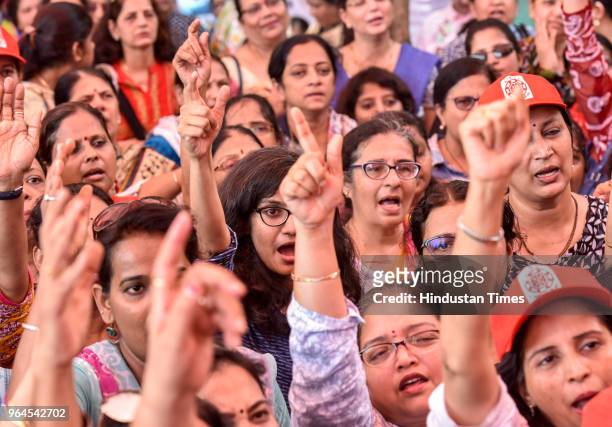 Bank workers shout slogans during a protest for the second day protesting a meagre 2 per cent wage hike offered by the Indian Banks Association , at...