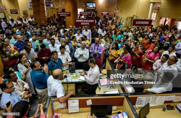 Indian Punjab National Bank workers stage a protest against a meagre 2 per cent wage hike offered by the Indian Banks Association , at Fort Branch,...