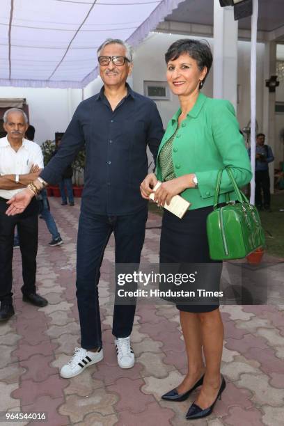 Fashion designer Rakesh Thakore with Australian High Commissioner to India Harinder Sidhu during an opening of veteran painter Jatin Das's exhibition...