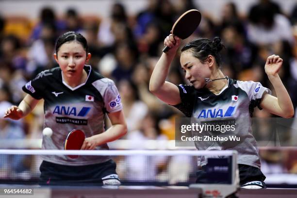 Hayata Hina and Ito Mima of Japan in action at the women's doubles quarter-final compete with Ng Wing Nam and Soo Wai Yam Minnie of Hong Kong China...