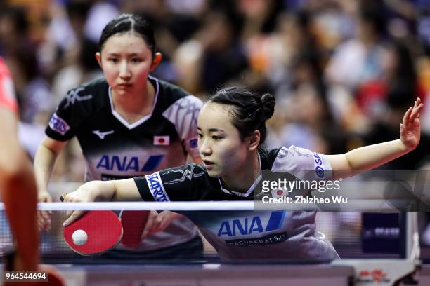Hayata Hina and Ito Mima of Japan in action at the women's doubles quarter-final compete with Ng Wing Nam and Soo Wai Yam Minnie of Hong Kong China...