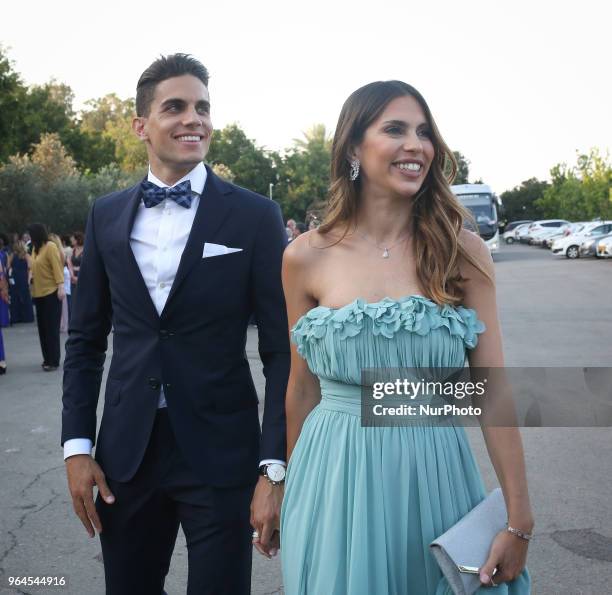 Real Betis' Spanish defender Marc Bartra and his girlfriend Melissa Jiménez attend Sergi Roberto, and the Israeli model, Coral Simanovich, wedding in...